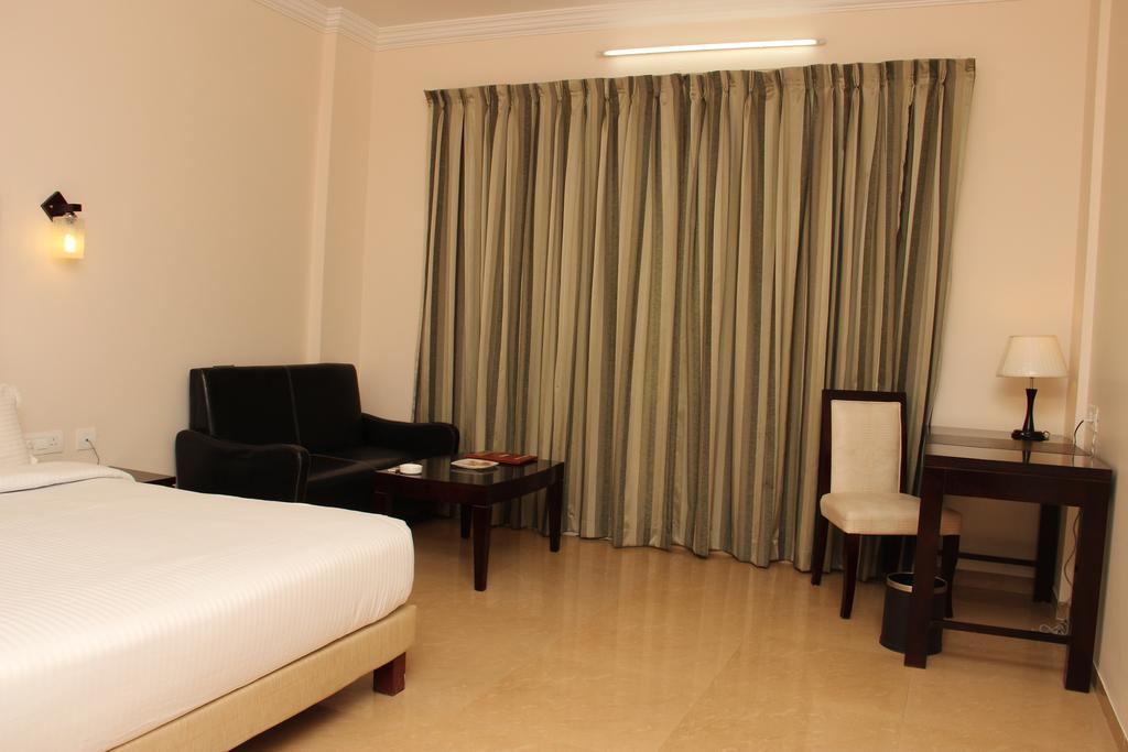 Quality Inn Palms Gāndhīdhām Стая снимка